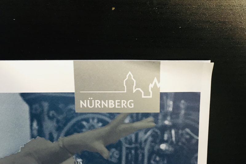 Editorial Design by Information und Form, Sonderfarbe Silber Logo Stadt Nürnberg